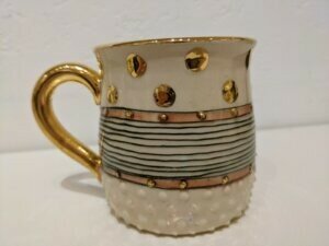 White and Gold Handmade Ceramic Mugs by Julia Roxburgh